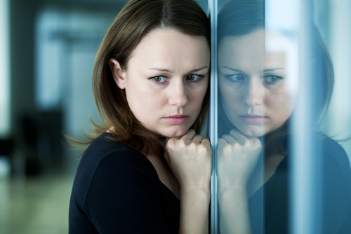 woman alone in grief